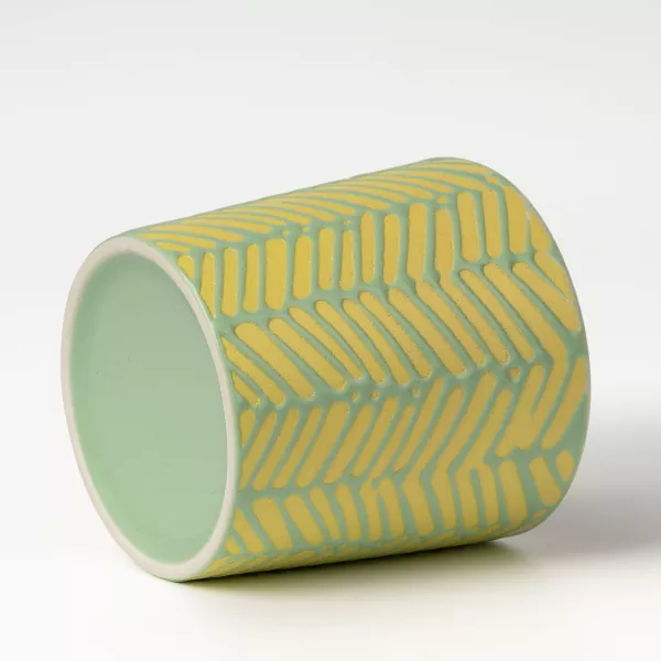 ज्यामितीय राहत सिरेमिक मैनबत्ती धारकहरू